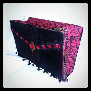 Handbag, clutch, purse.